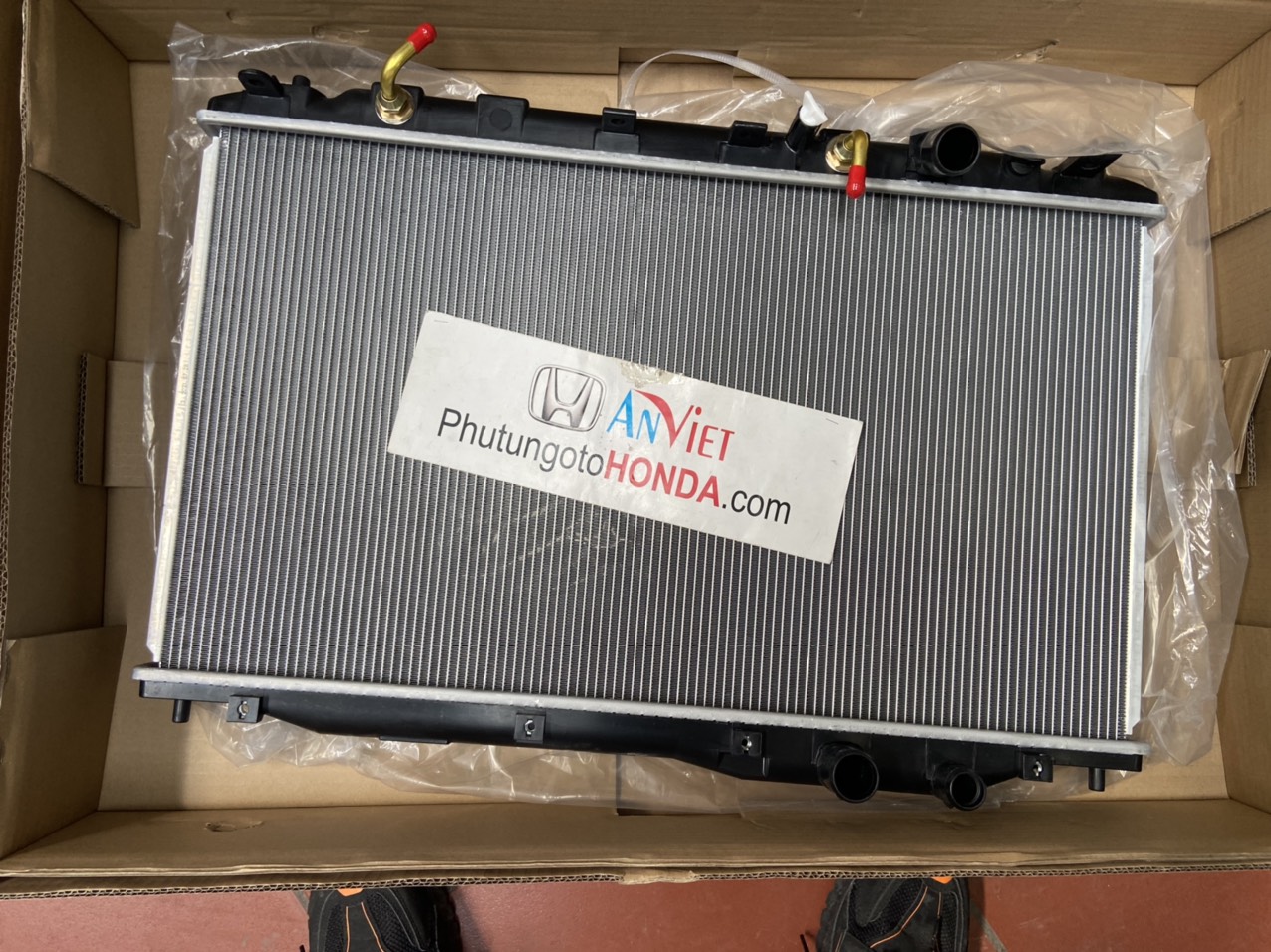 Két nước làm mát xe Honda CIVIC 2006-2011 bản AT số tự động